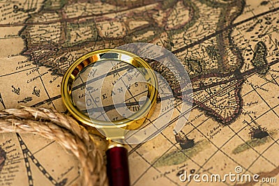 Retro magnifier with old map Stock Photo