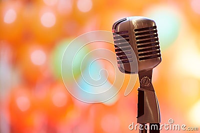 Retro microphone on orange background Editorial Stock Photo