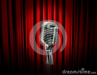 Retro microphone and red curtain Stock Photo