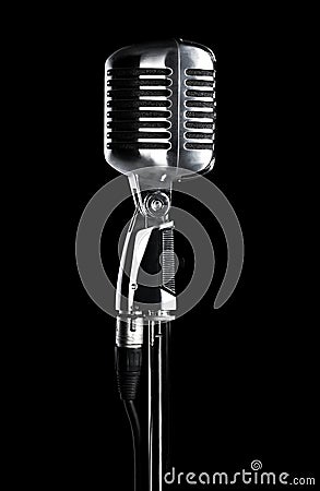 Retro microphone on stand on black Stock Photo