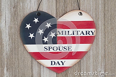 Retro Military Spouse Day heart sign on weathered wood Stock Photo