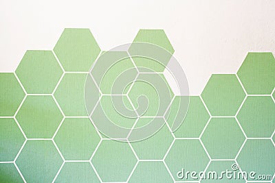 Retro modern green Hexagon tiled wall with half white wall, modern background texture, new interior Stock Photo