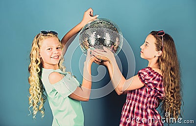 Retro music. Mirrors reflecting lights disco atmosphere. Holiday celebration. Entertainment concept. Sisters friends Stock Photo