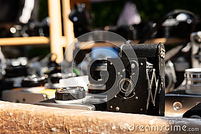 Retro and old cameras for sale at outdoor market Stock Photo