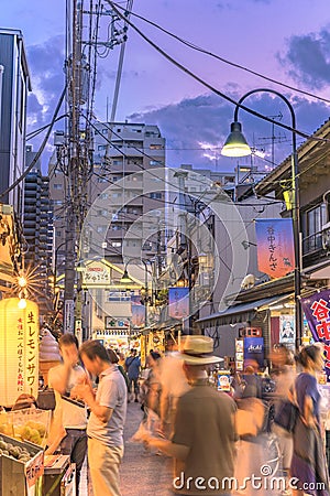 Retro old-fashionned shopping street Yanaka Ginza famous as a spectacular spot for sunset and also named the Evening Village. Editorial Stock Photo