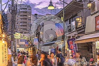 Retro old-fashionned shopping street Yanaka Ginza famous as a spectacular spot for sunset and also named the Evening Village. Editorial Stock Photo