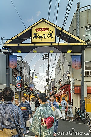 Retro old-fashionned shopping street Yanaka Ginza famous as a spectacular spot for sunset golden hour from the Yuyakedandan stairs Editorial Stock Photo