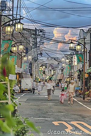 Retro old-fashionned shopping street Yanaka Ginza famous as a spectacular spot for sunset golden hour from the Yuyakedandan stairs Editorial Stock Photo