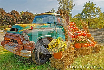 retro old '56 GMC 350 loaded with Fall agriculture harvest products Stock Photo