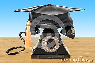 Retro phone with graduation cap on the wooden table, 3D rendering Stock Photo