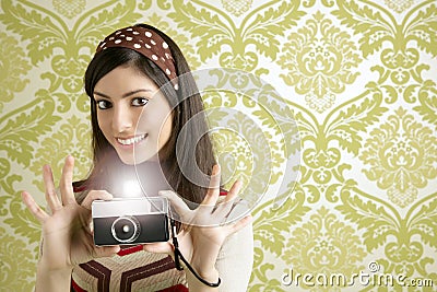 Retro photo camera woman green sixties wallpaper Stock Photo