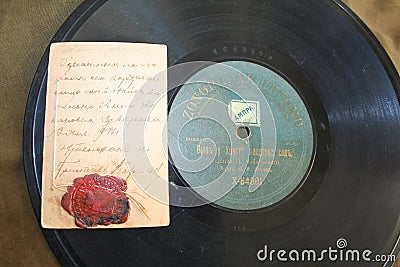 Retro record the phonograph and retro card with mastic seal... Editorial Stock Photo