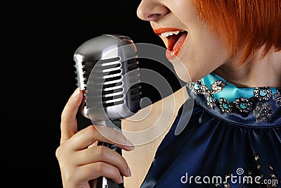 Retro redhead female singer Editorial Stock Photo