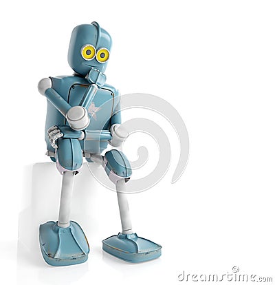 retro robot thinks sitting on the cube, artificial intelligence, ai Stock Photo