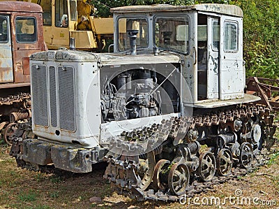 Retro rusty broken Russian tractor HTZ brand Editorial Stock Photo