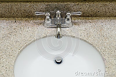 Retro style Chrome Faucet and old sink in bathroom Stock Photo