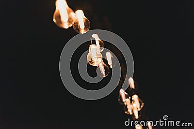 Retro style incandescent lamps. Light bulbs in the dark Stock Photo