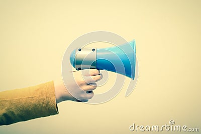 Retro style megaphone announcement background with vintage border and hold holding speaker Stock Photo