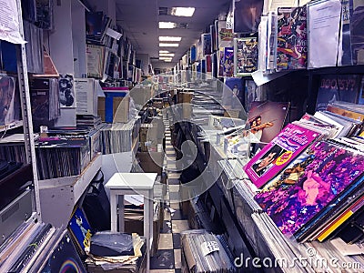 Retro styled image of boxes with vinyl turntable records on a flee market Editorial Stock Photo