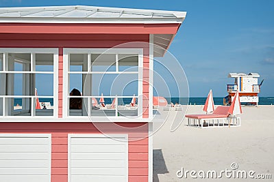 Retro styled pink and white timber kiosk on beach at Miami with Editorial Stock Photo