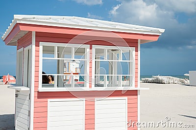 Retro styled pink and white timber kiosk on beach at Miami with Editorial Stock Photo