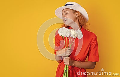 retro summer woman with flowers isolated on yellow, copy space. retro summer woman Stock Photo