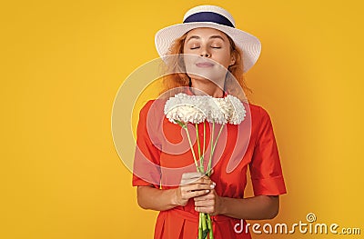 retro summer woman smell flowers in studio. retro summer woman with flowers Stock Photo