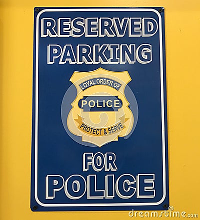 Retro Tin Sign Indicating Reserved Parking for Police Editorial Stock Photo