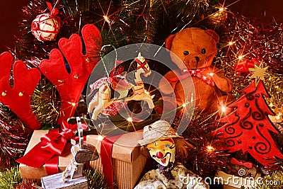 Retro toys and gifts under a christmas tree Stock Photo