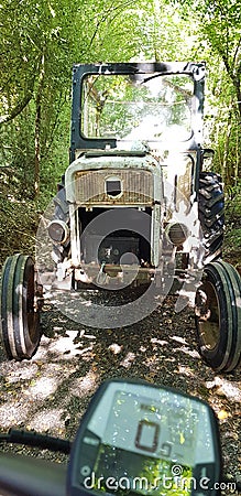 retro tractor bike ride old lane Stock Photo