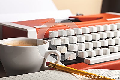 Retro typewriter and coffee cup on background Stock Photo