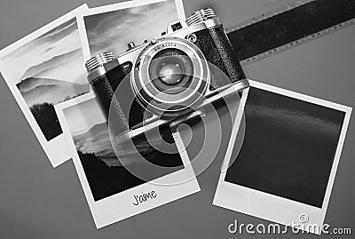 Retro vintage four instant photo frames cards on grey background with images of nature and blank photo with old camera film strip Stock Photo