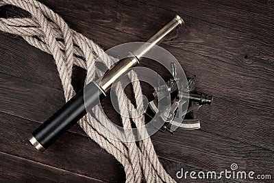 Retro vintage spyglass telescope with sextant Stock Photo