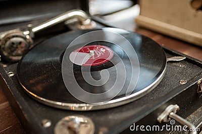 Retro vinyl record disk player in old box Stock Photo