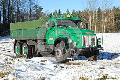 Retro Volvo truck from 1972 on snowy roads Editorial Stock Photo