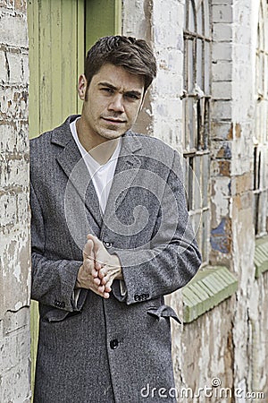 Retro young man on a vintage background Stock Photo