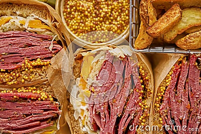 Reuben sandwich. Classic traditional American sandwich. Pastrami and corned beef on grilled bread Stock Photo