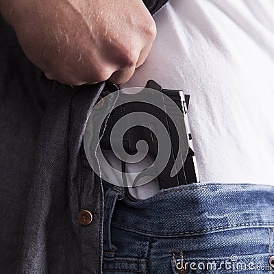 Revealing Concealed Firearm Stock Photo