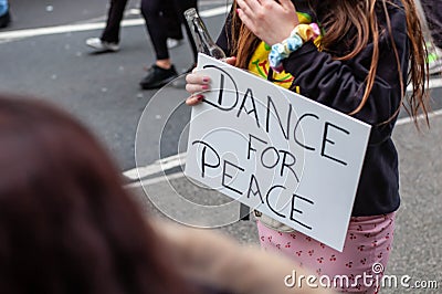 Reveller at a Dance For Peace Parade in London to fundraise for Red Cross and Disasters Emergency Committee Editorial Stock Photo