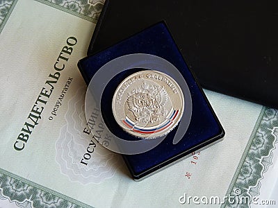 The reverse of the medal For special successes in study with an inscription the Russian Federation and lateral stamping a sil Stock Photo