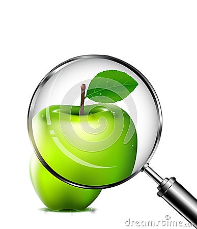 Reviewing an green apple with a magnifying glass Stock Photo