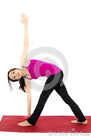 Revolved Triangle Pose in Yoga Stock Photo