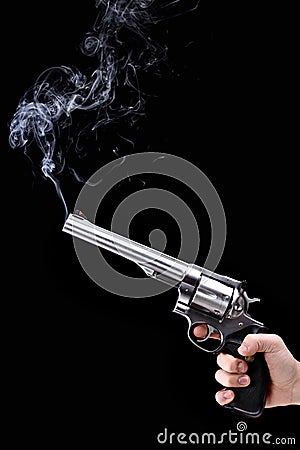 Revolver with smoke Stock Photo