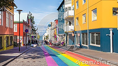 The Klapparstigur pedestrian street painted with the gay pride colors in Reykjavik, Iceland. Editorial Stock Photo