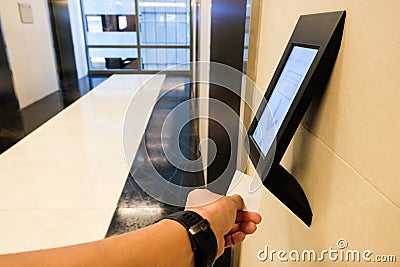 RFID reader in front of the elevator which only allow authorized person in the building to use. One of security feature in modern Stock Photo