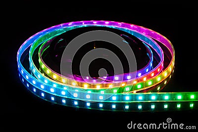 RGB LED strip on reel with black background Stock Photo