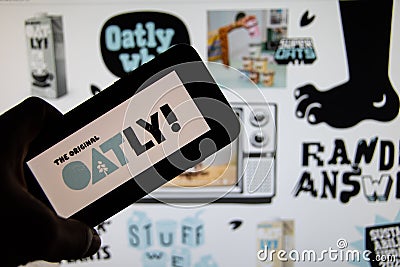 Rheinbach, Germany 23 October 2021, The brand logo of the Swedish food company `Oatly` on the display of a smartphone focus on Editorial Stock Photo