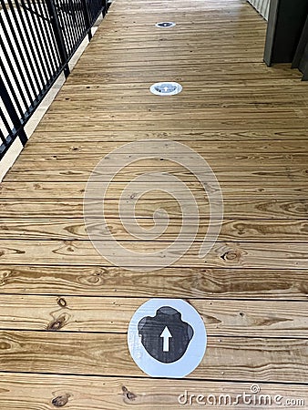 Rhino footsteips through the Ashfall Fossil Beds State Historic Park Rhino Barn in Royal, NE Editorial Stock Photo