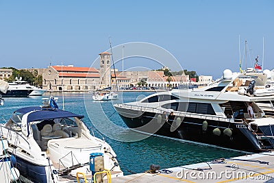 Yachts at seaport of Rhodes town on Rhodes island, Greece Editorial Stock Photo