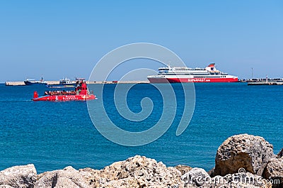 View of Mandraki harbor in Rhodes Editorial Stock Photo